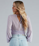 With fun and flirty details, Boho Dreams Surplice Peasant Woven Top shows off your unique style for a trendy outfit for the summer season!