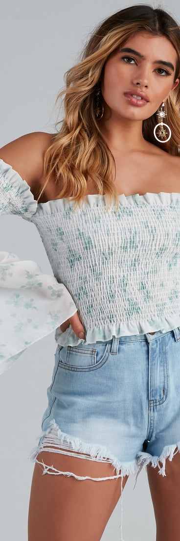 With fun and flirty details, Radar On Florals Smocked Crop Top shows off your unique style for a trendy outfit for the summer season!