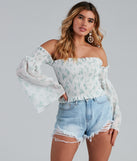 With fun and flirty details, Radar On Florals Smocked Crop Top shows off your unique style for a trendy outfit for the summer season!