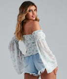 With fun and flirty details, Radar On Florals Smocked Crop Top shows off your unique style for a trendy outfit for the summer season!