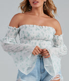 With fun and flirty details, Radar On Florals Smocked Crop Top shows off your unique style for a trendy outfit for the summer season!