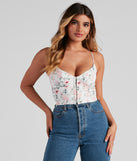 With fun and flirty details, Cue Floral Sweetheart Bustier shows off your unique style for a trendy outfit for the summer season!