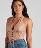 With fun and flirty details, Made To Be Seen PU Halter Crop Top shows off your unique style for a trendy outfit for the summer season!