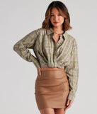 The trendy Cool And Classic Plaid Twist Top is the perfect pick to create a holiday outfit, new years attire, cocktail outfit, or party look for any seasonal event!