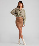With fun and flirty details, Cool And Classic Plaid Twist Top shows off your unique style for a trendy outfit for the summer season!