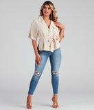 With fun and flirty details, Button Things Up Tie-Waist Top shows off your unique style for a trendy outfit for the summer season!