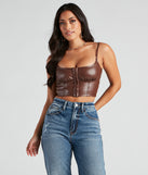With fun and flirty details, She's Sleek Faux Leather Cropped Corset shows off your unique style for a trendy outfit for the summer season!