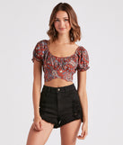 With fun and flirty details, Free Spirited Paisley Tie-Back Crop Top shows off your unique style for a trendy outfit for the summer season!