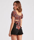 With fun and flirty details, Free Spirited Paisley Tie-Back Crop Top shows off your unique style for a trendy outfit for the summer season!