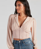 With fun and flirty details, Life's A Party Chiffon Corset Top shows off your unique style for a trendy outfit for the summer season!
