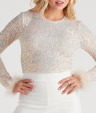 With fun and flirty details, Flawless Glam Sequin Feather Trim Crop Top shows off your unique style for a trendy outfit for the summer season!