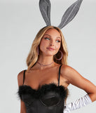 Furry marabou trim on a black satin bodysuit styled as a women’s Halloween bunny costume 