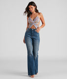 With fun and flirty details, Mystical Glam Butterfly Glitter Crop Top shows off your unique style for a trendy outfit for the summer season!