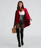 Lil' Red Adult Costume from Windsor featuring a lace-up corset bodysuit, a red velvet hooded cape, tights, and black faux suede lace-up boots.