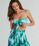 With fun and flirty details, the Forever Muse Abstract Satin Bandeau Crop Top shows off your unique style for a trendy outfit for summer!
