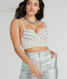 The waist-defining bodice style of the Fabulously Glam Rhinestone And Pearl Woven Bustier is perfect for making a statement with your outfit and provides the boning, molded cups, or lace-up details that capture the corset trend.