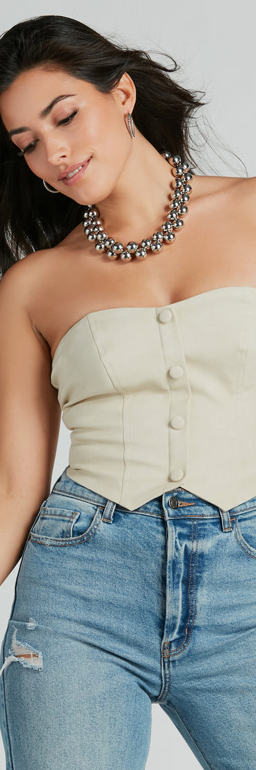 With fun and flirty details, the New Scene Strapless Faux Leather Vest shows off your unique style for a trendy outfit for summer!