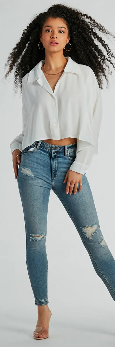Whether fitted or flowy, the Modern Trend Long Sleeve Button Up Crop Blouse is a long-sleeve top that offers endless styling options as a layer or a standalone piece to elevate your outfit for the season.