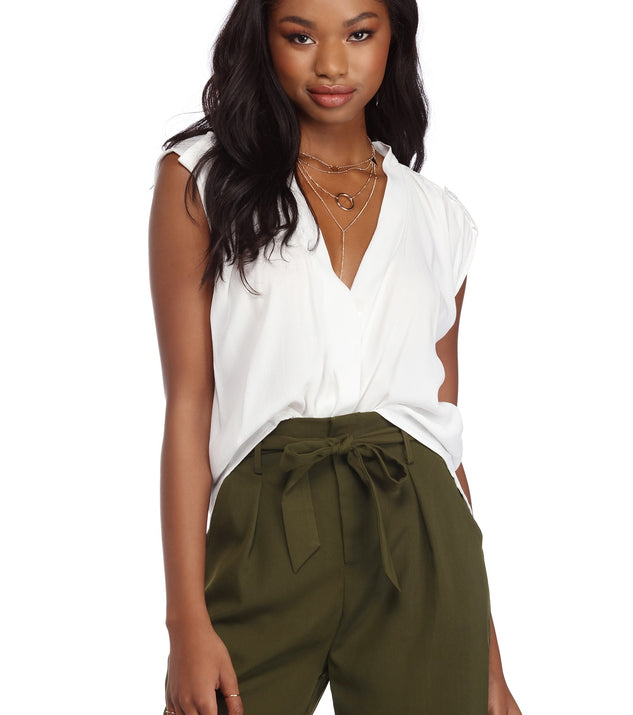 With fun and flirty details, Draped Drama Top shows off your unique style for a trendy outfit for the summer season!