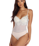 With fun and flirty details, Diamonds & Pearls Bodysuit shows off your unique style for a trendy outfit for the summer season!