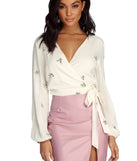 Spring Into Action Wrap Blouse