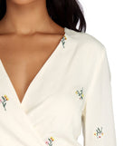 Spring Into Action Wrap Blouse