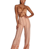 With fun and flirty details, Border Theory Crop Top shows off your unique style for a trendy outfit for the summer season!
