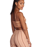 With fun and flirty details, Border Theory Crop Top shows off your unique style for a trendy outfit for the summer season!