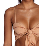 With fun and flirty details, Border Theory Crop Top shows off your unique style for a trendy outfit for the summer season!