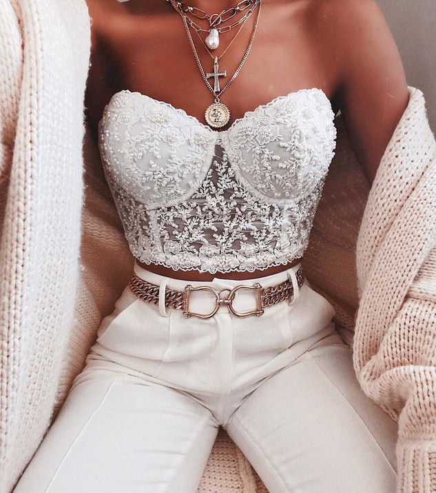 With fun and flirty details, Pretty In Pearls Hand Beaded Bustier shows off your unique style for a trendy outfit for the summer season!
