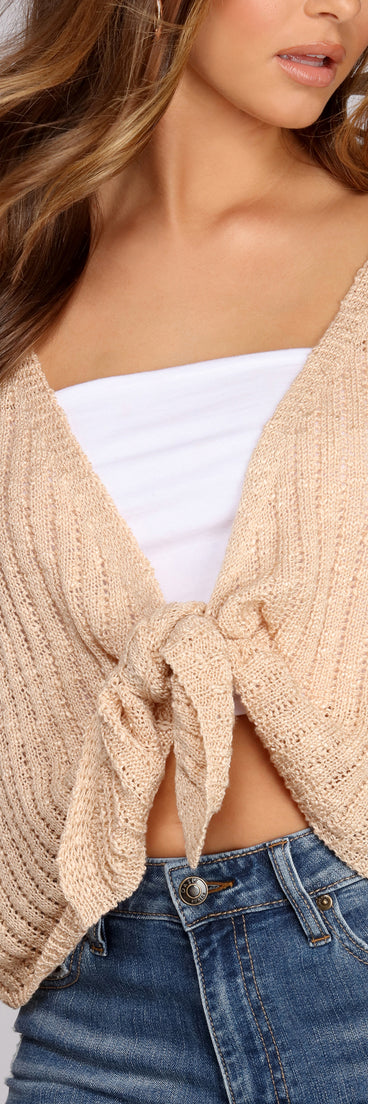 With fun and flirty details, Keeping Knit Cozy Tie Front Sweater shows off your unique style for a trendy outfit for the summer season!