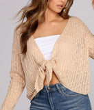 With fun and flirty details, Keeping Knit Cozy Tie Front Sweater shows off your unique style for a trendy outfit for the summer season!
