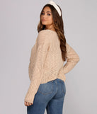With fun and flirty details, Keeping Knit Cozy Tie Front Sweater shows off your unique style for a trendy outfit for the summer season!