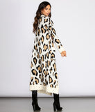 With fun and flirty details, Distressed Leopard Print Duster shows off your unique style for a trendy outfit for the summer season!