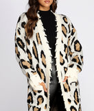 With fun and flirty details, Distressed Leopard Print Duster shows off your unique style for a trendy outfit for the summer season!