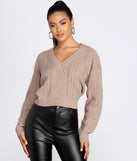 With fun and flirty details, Tie Back Cropped Sweater shows off your unique style for a trendy outfit for the summer season!