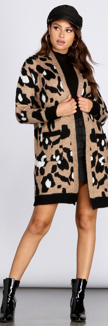 With fun and flirty details, Long-Line Leopard Cardigan shows off your unique style for a trendy outfit for the summer season!