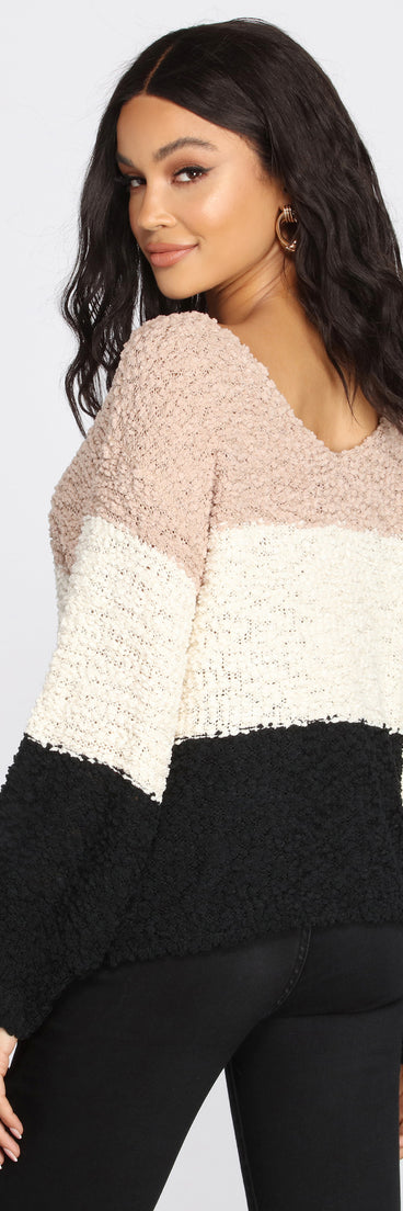 With fun and flirty details, Colorblock Popcorn Knit Sweater shows off your unique style for a trendy outfit for the summer season!