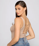 With fun and flirty details, Lace-Up Chic Sleeveless Bodysuit shows off your unique style for a trendy outfit for the summer season!