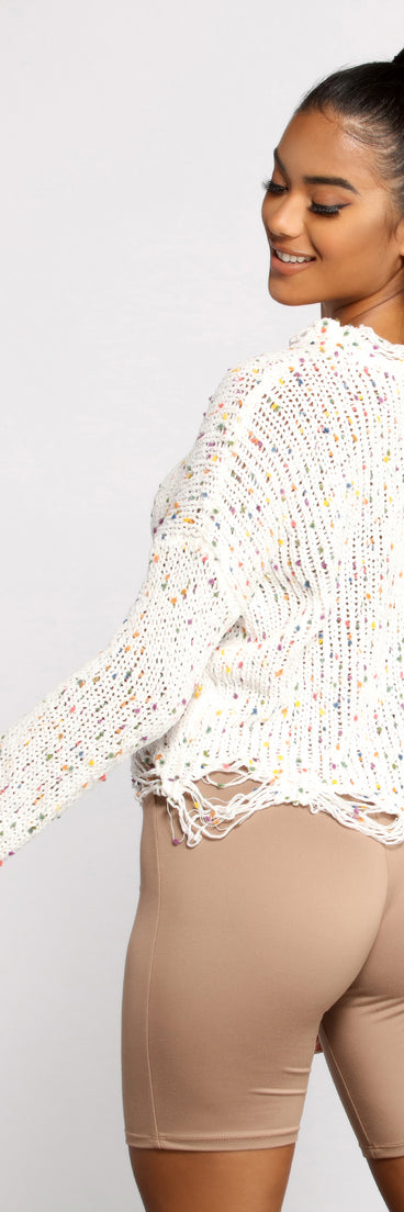 With fun and flirty details, Issa Celebration Confetti Knit Distressed Sweater shows off your unique style for a trendy outfit for the summer season!