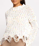 With fun and flirty details, Issa Celebration Confetti Knit Distressed Sweater shows off your unique style for a trendy outfit for the summer season!