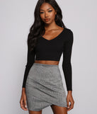 With fun and flirty details, Ribbed Knit Long Sleeve Cropped Sweater shows off your unique style for a trendy outfit for the summer season!