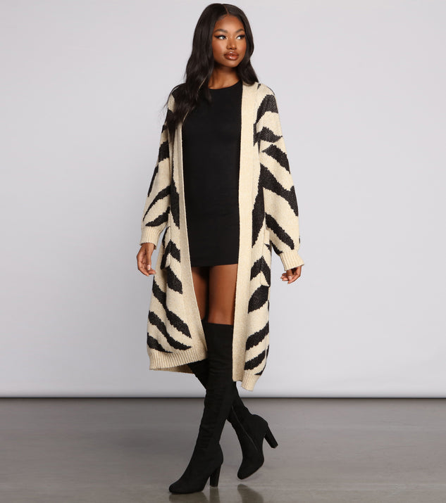 With fun and flirty details, Zebra Print Long Line Cardigan shows off your unique style for a trendy outfit for the summer season!