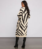With fun and flirty details, Zebra Print Long Line Cardigan shows off your unique style for a trendy outfit for the summer season!