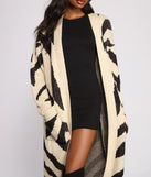 With fun and flirty details, Zebra Print Long Line Cardigan shows off your unique style for a trendy outfit for the summer season!