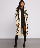 With fun and flirty details, Zebra Print Long Line Cardigan shows off your unique style for a trendy outfit for the summer season!