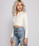 The trendy Collared Cropped Knit Henley Top is the perfect pick to create a holiday outfit, new years attire, cocktail outfit, or party look for any seasonal event!