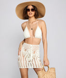 You’ll look stunning in the Crochet Cutie Triangle Crop Top when paired with its matching separate to create a glam clothing set perfect for parties, date nights, concert outfits, back-to-school attire, or for any summer event!