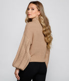 With fun and flirty details, Cuddle Up Cable Knit Sweater shows off your unique style for a trendy outfit for the summer season!