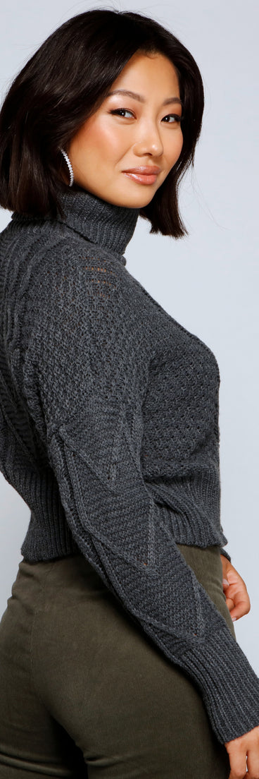 With fun and flirty details, Layer On The Cozy Cable Knit Sweater shows off your unique style for a trendy outfit for the summer season!